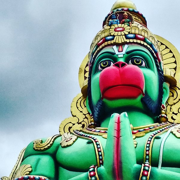 Is Hanuman a devotee or God and is it fair to call him Monkey God?