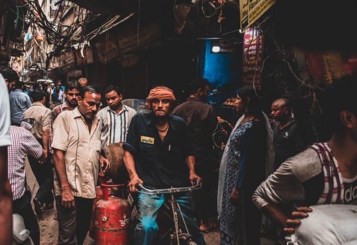 Social distancing is becoming a public spectacle in the streets of Delhi